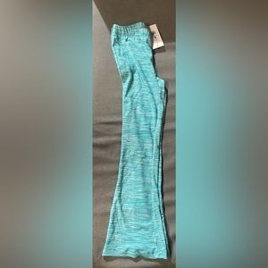 New with tags. Girls size 7/8 flare leg leggings